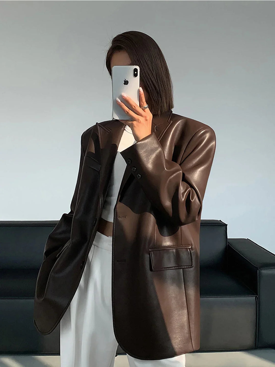 Oversize bunda s koženým efektem, elegantní a moderní pro ženy